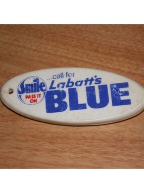 Vintage Labatt's Blue Bottle Opener Floating